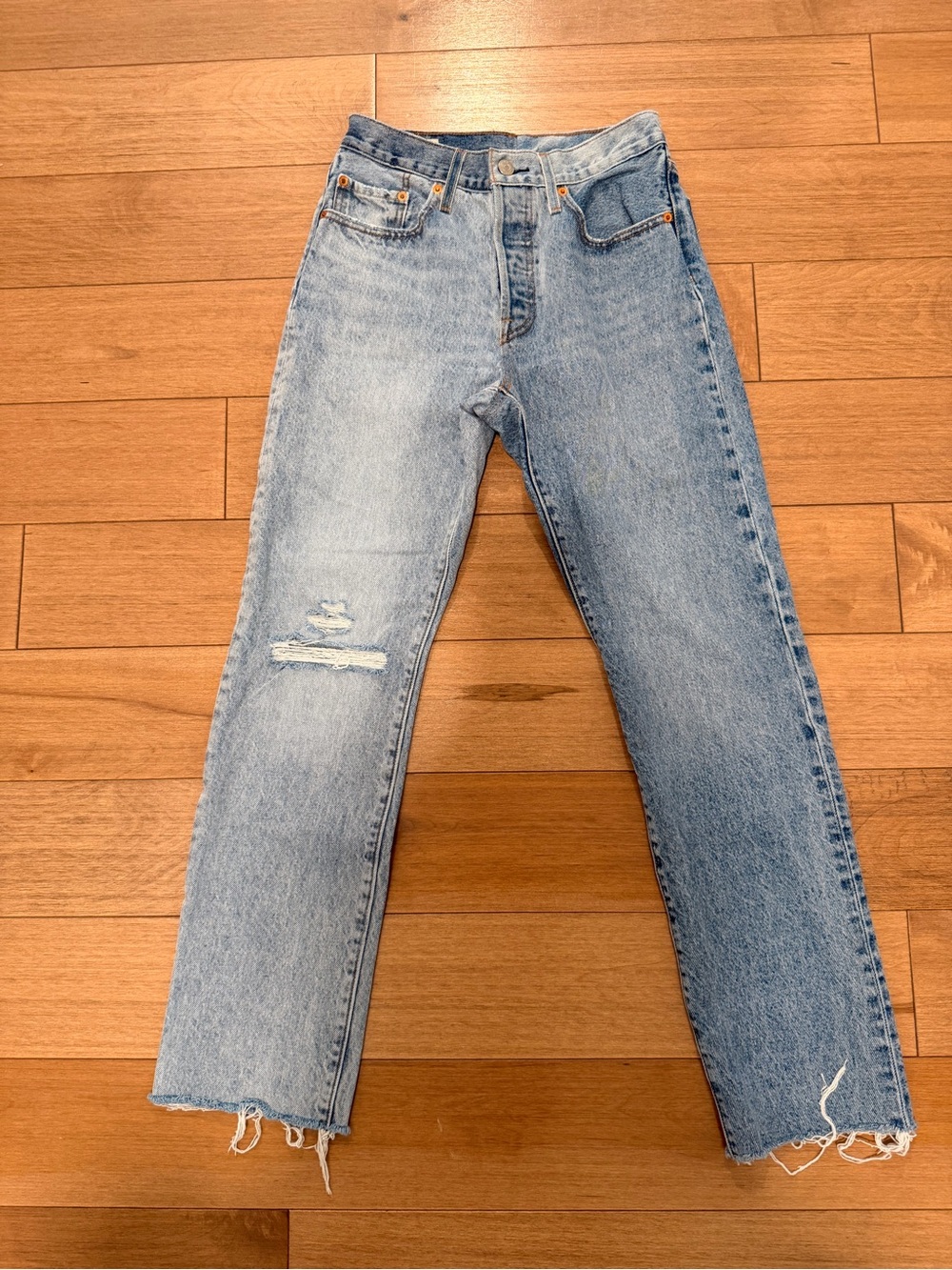 Levi's Light Blue 501 Jeans with Distressed Knee